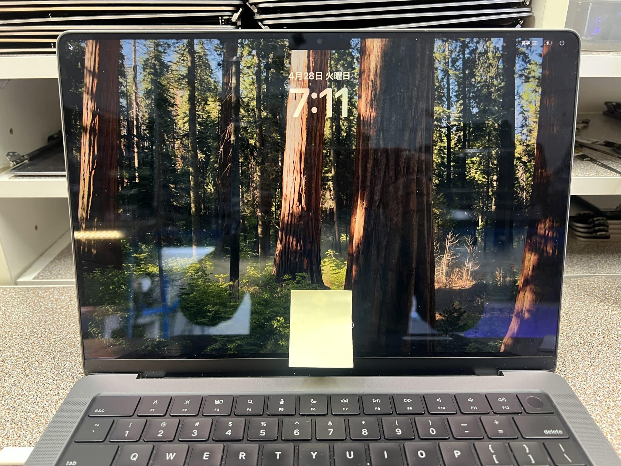 14-inch MacBook Pro fully repaired after water damage and no backlight repair